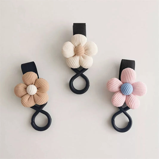 BloomLoop Baby Stroller Hook - Versatile stroller accessory with a small flower pattern for extra storage.