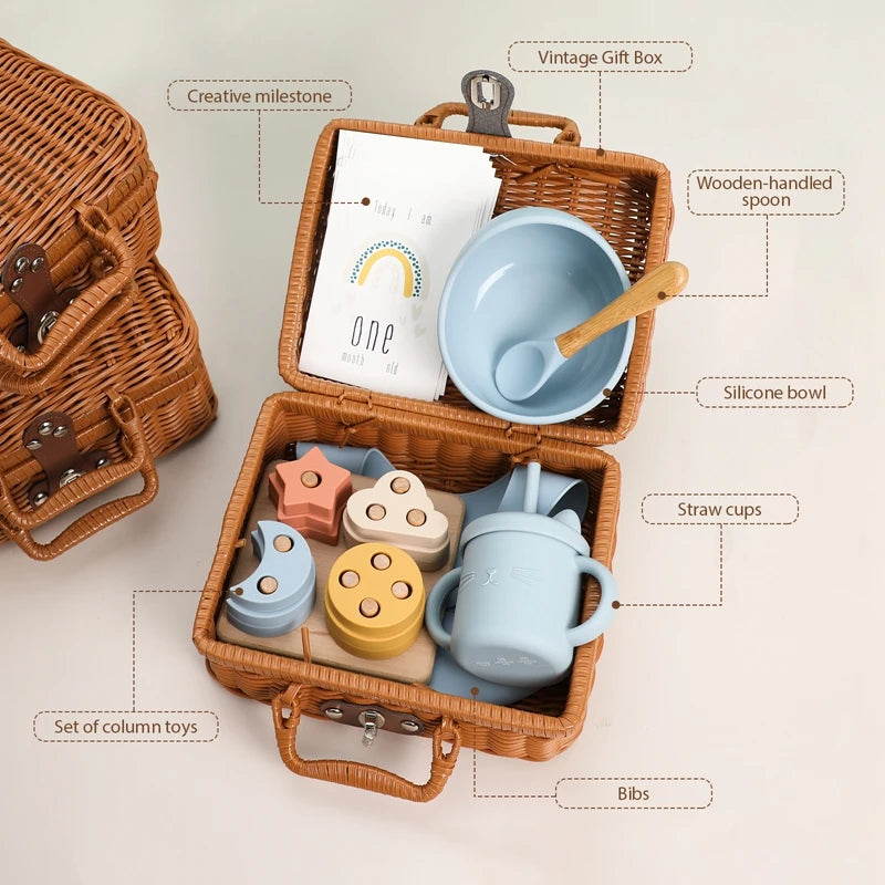 product specification of Meow and Grow™ Baby Gift Set featuring a silicone bib, cat cup, and wooden rainbow stacker in a vintage-style gift box