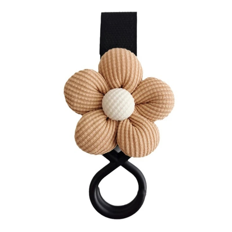 BloomLoop™ Baby Stroller Hook in Brown-Black - Versatile stroller accessory with a small flower pattern for extra storage.