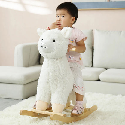 WhimsiRock™ Plush Animal Rocker: A super soft and huggable Plush Animal Rocker designed for toddlers aged 1-5, with solid wood handles and hypoallergenic filling. Perfect for imaginative play and safe, gentle rocking. a baby sitting on happy alpaca 2