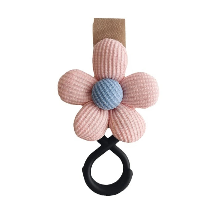 BloomLoop™ Baby Stroller Hook in Pink-Brown - Versatile stroller accessory with a small flower pattern for extra storage.