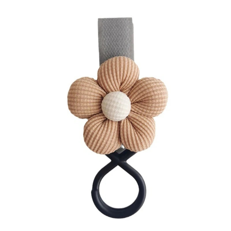 BloomLoop™ Baby Stroller Hook in Brown-Grey - Versatile stroller accessory with a small flower pattern for extra storage.