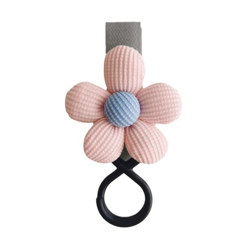 BloomLoop™ Baby Stroller Hook in Pink-Grey - Versatile stroller accessory with a small flower pattern for extra storage.