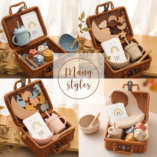 Meow and Grow™ Baby Gift Set featuring a silicone bib, cat cup, and wooden rainbow stacker in a vintage-style various gift box