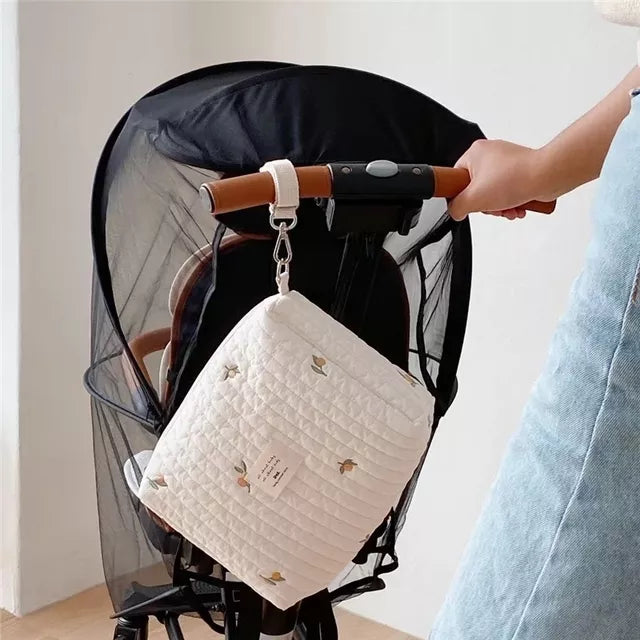 another angle of showing Boho Style Newborn Baby Care Diaper Bag can be easily set up with baby stroller