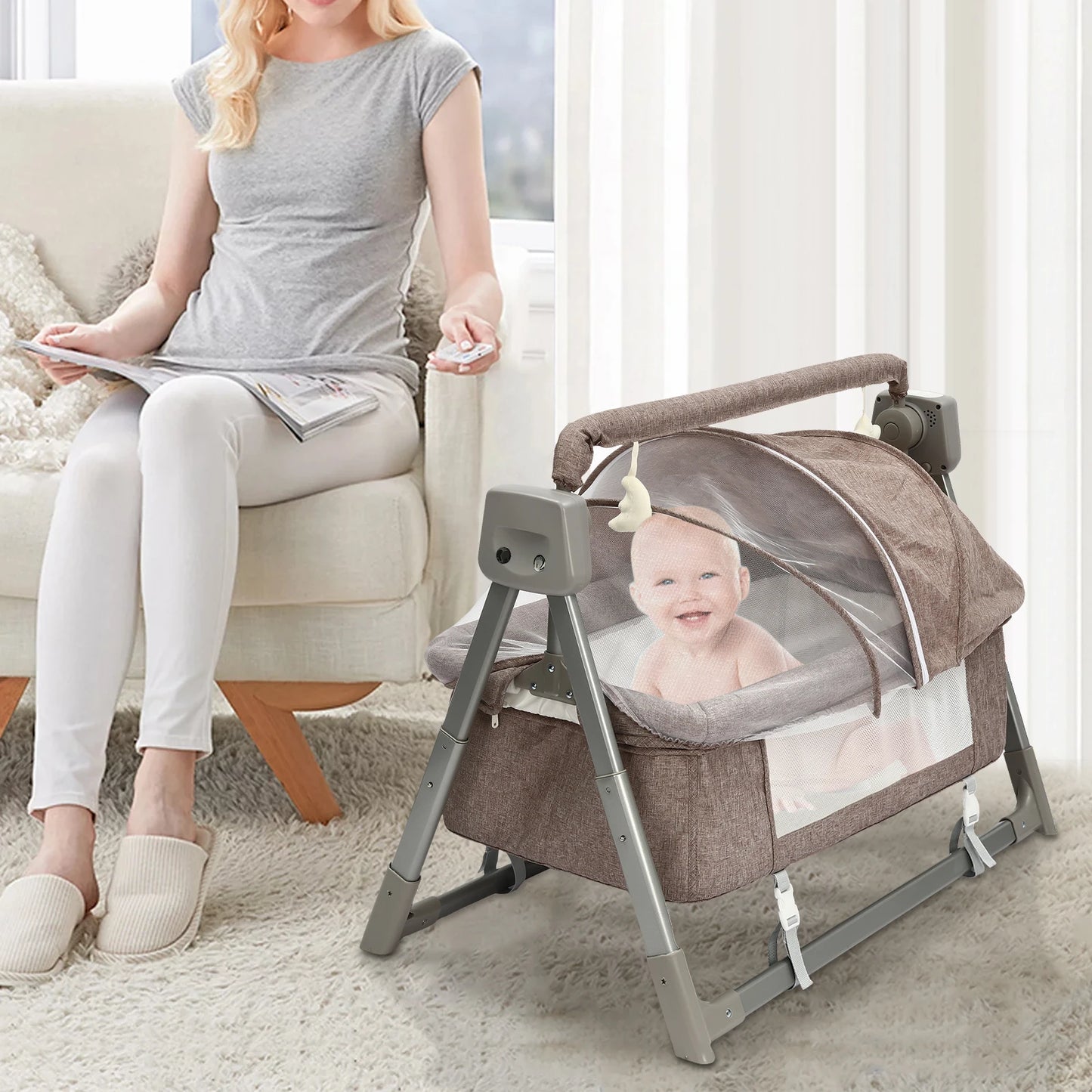 Mother watching her son playing in Little Ones® BassiNest Flex Portable Bassinet