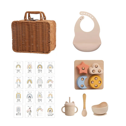 all products with age describing Meow and Grow™ Baby Gift Set featuring a silicone bib, cat cup, and wooden rainbow stacker in a vintage-style gift box