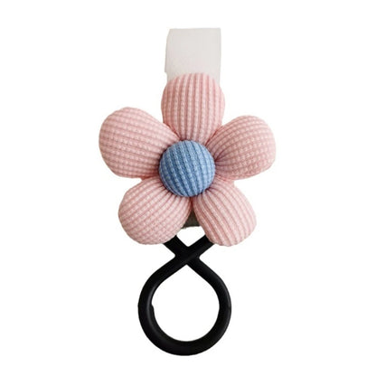 BloomLoop™ Baby Stroller Hook in Pink-White - Versatile stroller accessory with a small flower pattern for extra storage.