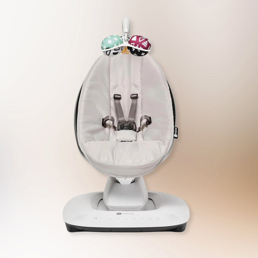 Grey MamaRoo Multi-Motion Baby Swing featuring a machine-washable seat cover, removable toy bar, and app compatibility for customizable motions and sounds.