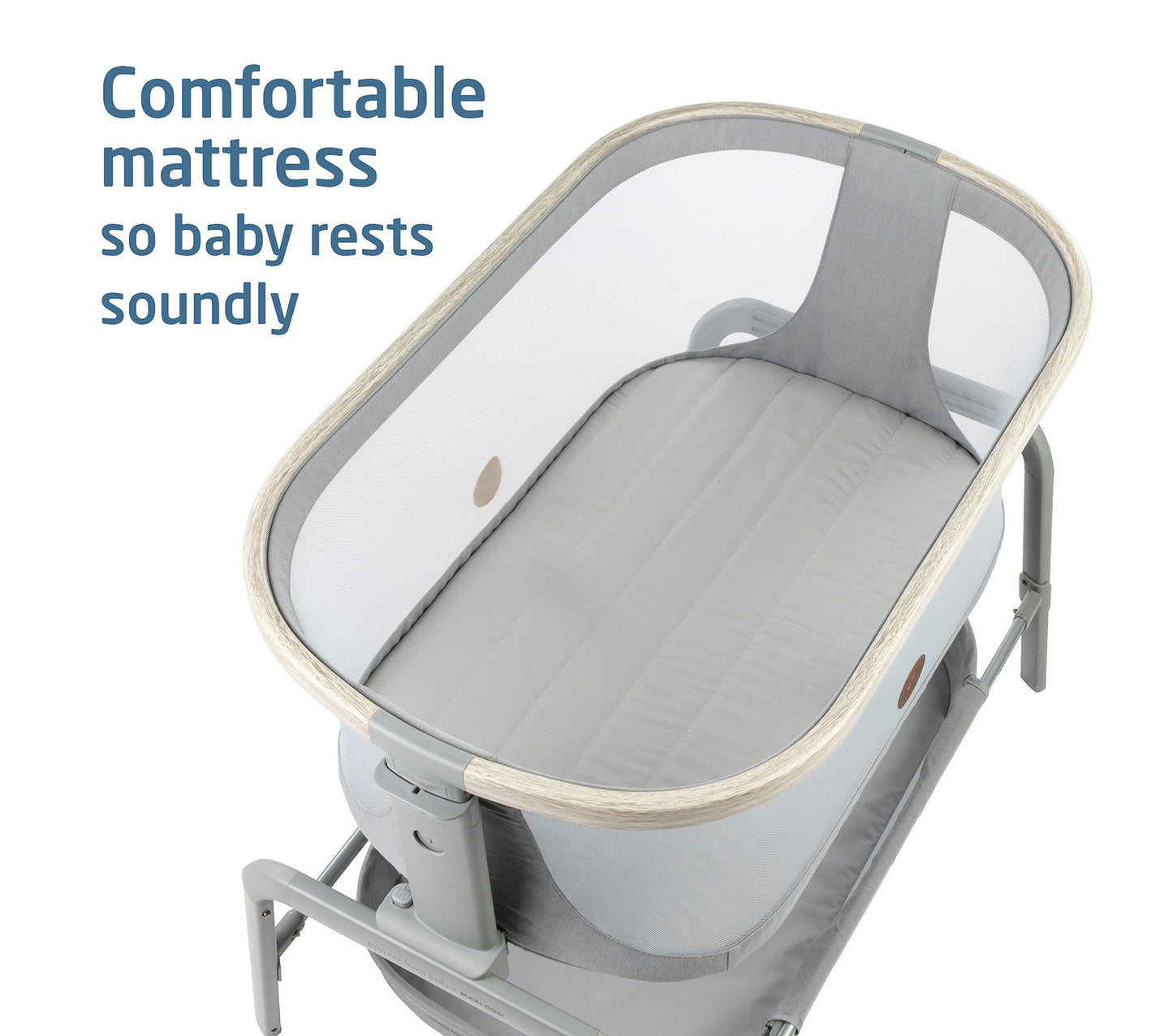 Maxi-Cosi® Iora Newborn Bassinet with a large storage basket, showcasing its sleek design and sturdy frame